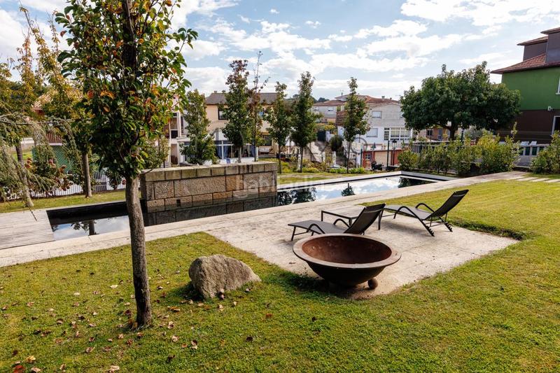 Foto 1cde24ed-3fdc-40cf-b049-ae7147550b77. Haus mit heizung parking pool in Panxón Nigrán