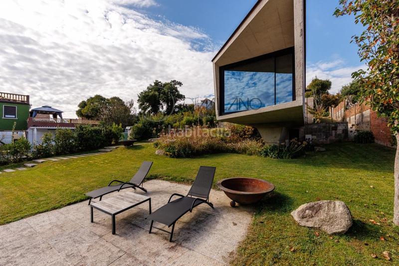 Foto a18acd56-3790-46a2-8a86-47a5146fff36. Haus mit heizung parking pool in Panxón Nigrán