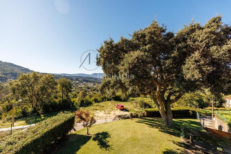 Foto 03c481cb-0795-4350-b895-eee0e8113bb2. Chalet con riscaldamento parcheggio piscina in Camos Nigrán