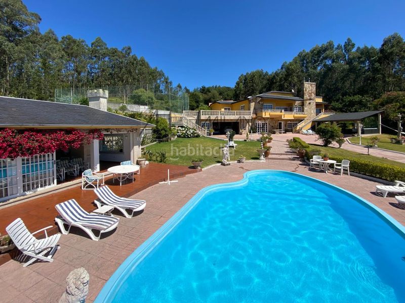 Foto 19d332fb-7072-4131-b6d4-42b67186bc4b. Xalet amb calefacció aparcament piscina a Darbo Cangas