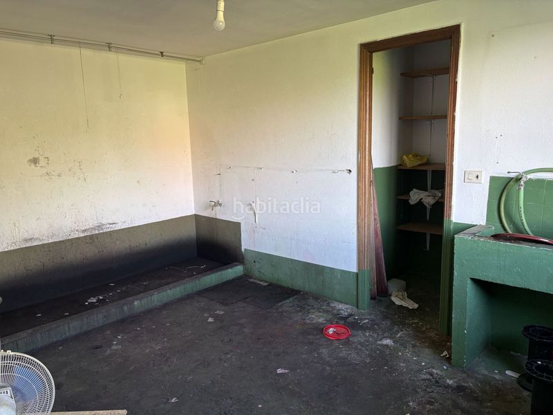 Foto b5092f02-b74e-46e1-97c0-ca40aff5877d. Casa adossada a Darbo Cangas