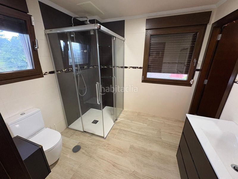 Foto adcda166-fd44-44d2-b204-dab58d649f1a. Casa amb aparcament a Coiro Cangas
