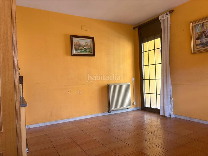 Foto f1871281-e126-4c56-be57-553d29d63d14. Casa adossada amb calefacció aparcament a Sant Celoni