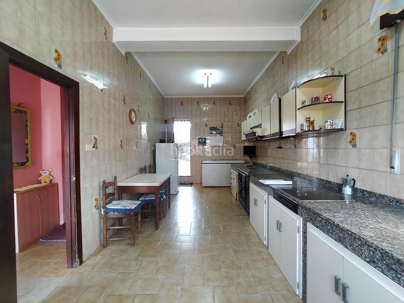 Foto 1b797352-f9a2-43a6-9aa9-3cf4c1829b85. Casa adossada a Pravia