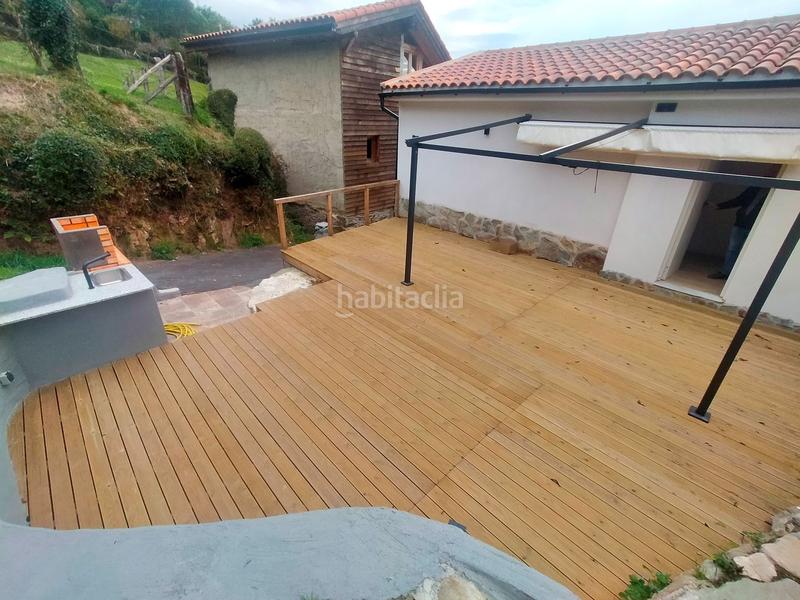 Foto fa241460-9a32-4f8c-a23c-1e661f275a38. Haus mit heizung in Cudillero