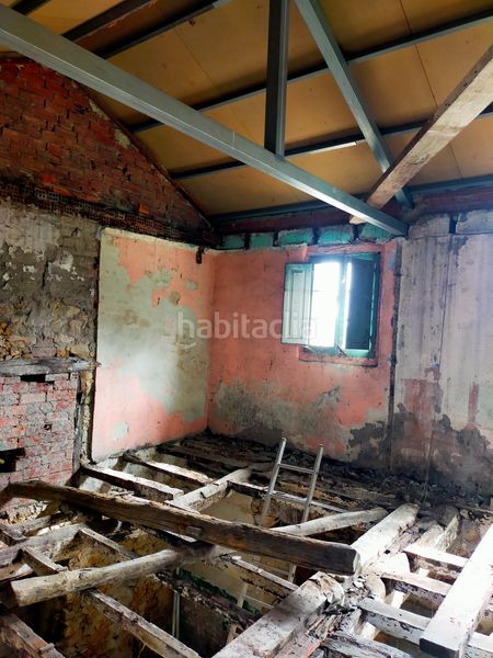 Foto 56e870f8-da24-4ab5-a958-3022a255719b. Casa adossada a Pravia