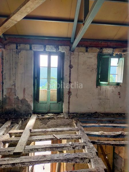 Foto fa890140-e736-4f92-acb4-9cfb2bc18e64. Casa adossada a Pravia