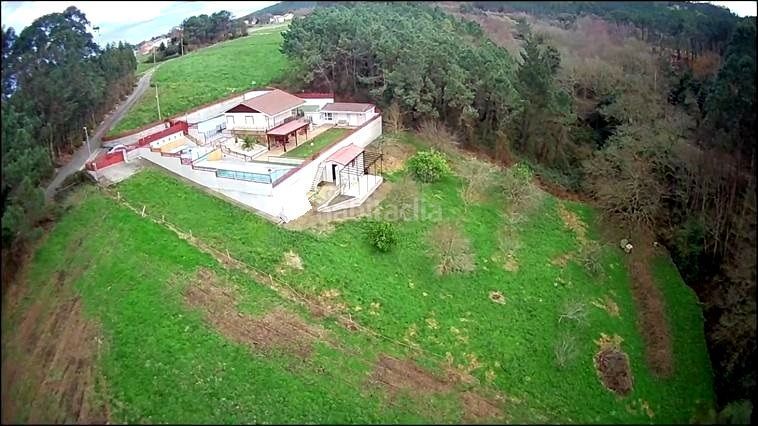 Foto f6228fae-14d7-4491-8a97-bf89d1e39642. House with heating pool in Cudillero