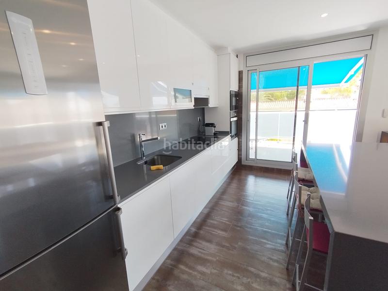 Foto c5d3f559-354d-43fb-b567-661b67d0e60d. Casa adosada vivienda muy exclusiva en el paseo maritimo. en Sant Carles de la Ràpita