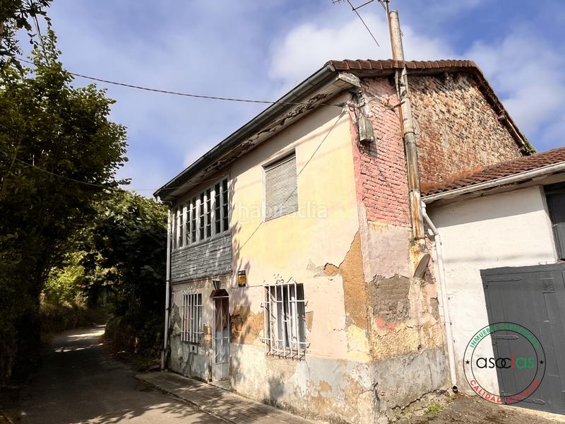 Foto ede47c44-277b-4051-8dab-1332db20e3ef. Casa pareada casa de dos plantas para rehabilitar con finca edificable independiente en Siero