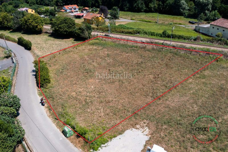 Foto c4ae0e57-4a73-4543-ad1d-2f8670be9384. Terreny residencial a Cenero Gijón