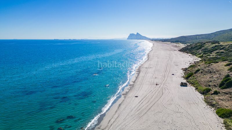Foto 320c2a9a-d659-47a5-b5cf-3ece8dce78ab. Casa aparellada amb aparcament piscina a La Alcaidesa