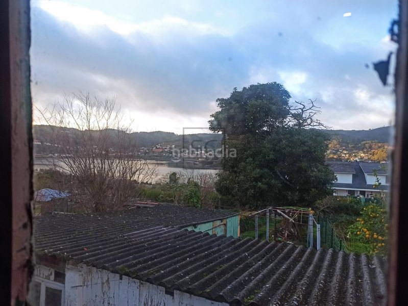 Foto 0fdc5612-90b0-4a1a-afa9-55e4fcad0d77. Casa amb aparcament a Canido Ferrol