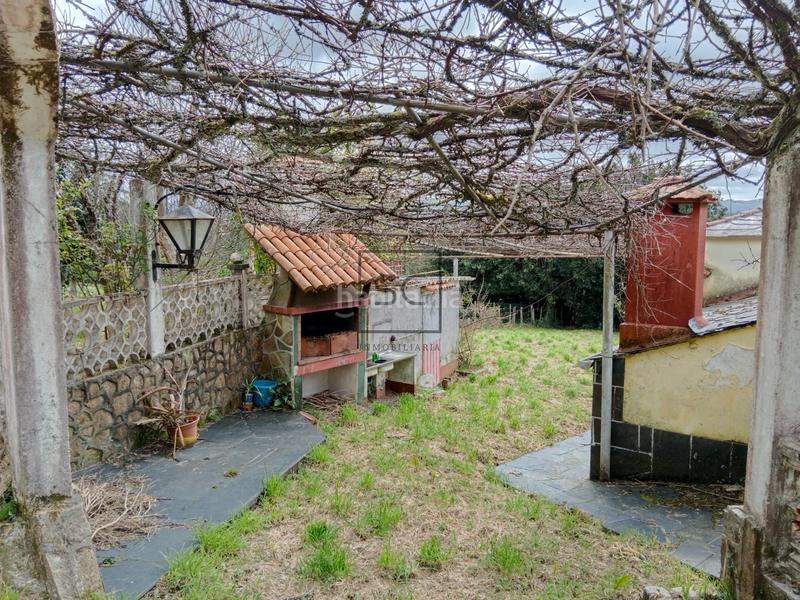 Foto fe14a6d9-8593-4b15-bda5-9ef0936b2fc5. Casa  con finca y garaje en Moeche