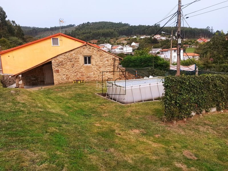 Foto 04382f83-615a-4594-a6ac-8882ae3950e2. Casa adossada amb calefacció aparcament a Área Rural Ferrol