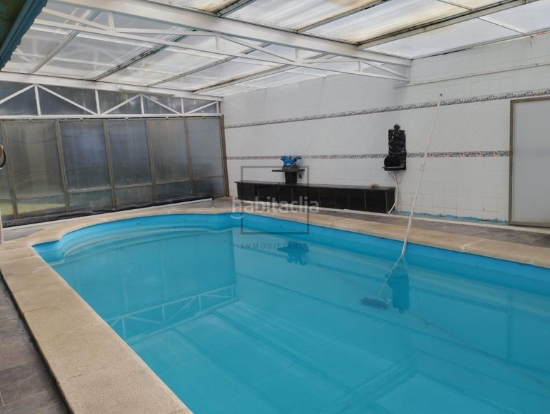 Foto 935a9178-d7c3-4341-9394-53a8bb5eeb45. Casa amb calefacció aparcament piscina a Área Rural Ferrol