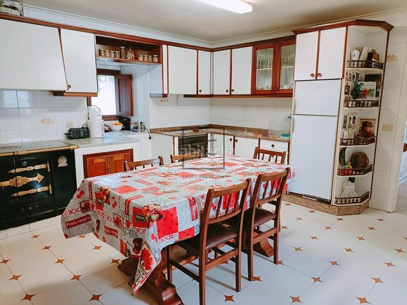 Foto fac8193e-2b90-49aa-8128-48119f0c0396. Casa amb calefacció aparcament a Piñeiros - Freixeiro Narón