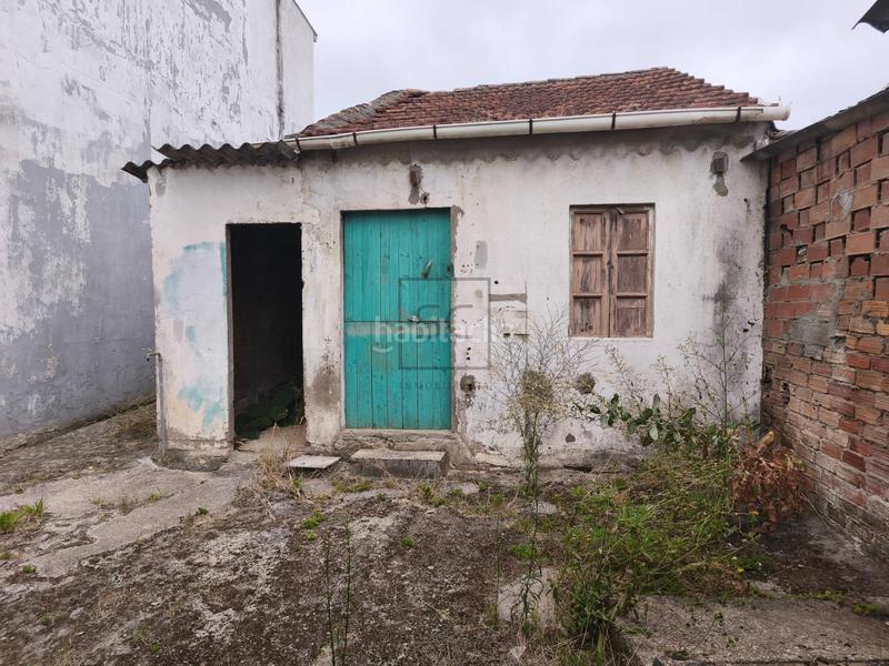 Foto a8b03107-5fff-4808-9520-e4b9d95cc525. Casa adosada  con bodega y finca en piñeiros, en Narón