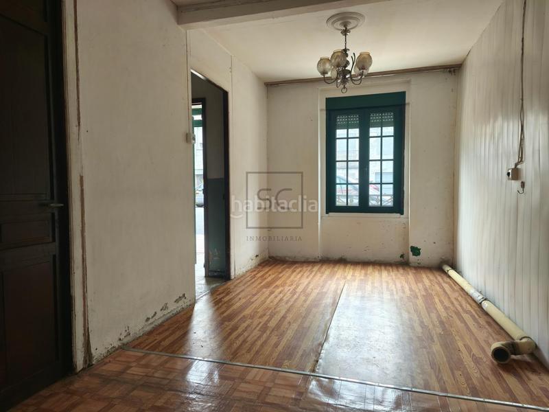 Foto c23f0161-461f-47b5-a9a7-2df4948dab24. Casa adosada  con bodega y finca en piñeiros, en Narón