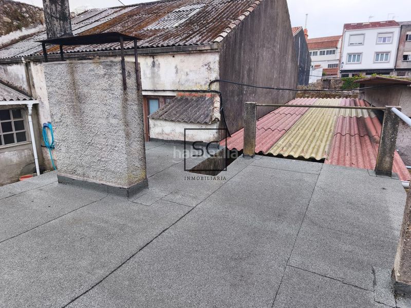 Foto a411fc38-ce94-498f-94d2-cf974823edb8. Casa adossada amb aparcament a Neda