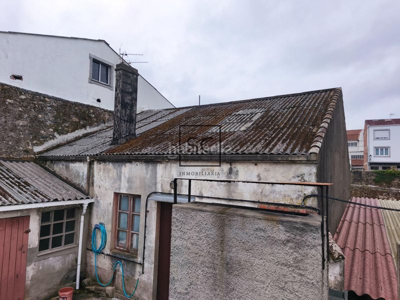 Foto b180edbd-94a0-4b80-914f-600ea8d3107c. Casa adossada amb aparcament a Neda