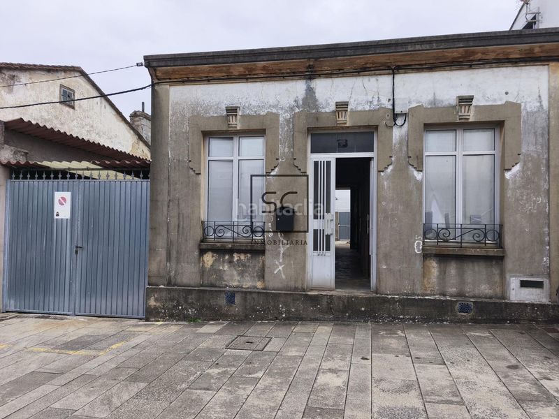 Foto b24e3c2b-e924-4474-8198-dd72c19c4916. Casa adossada amb aparcament a Neda