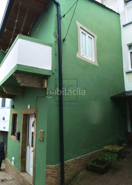Foto 3f2f96b9-cc6d-41dc-ad52-e1838bcb6a03. Casa adossada a Mañón