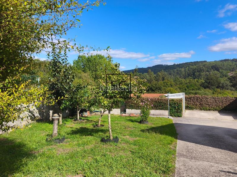 Foto 1357f994-30ed-42fd-b309-7ba95d069cb1. Casa adossada amb calefacció aparcament a Miño