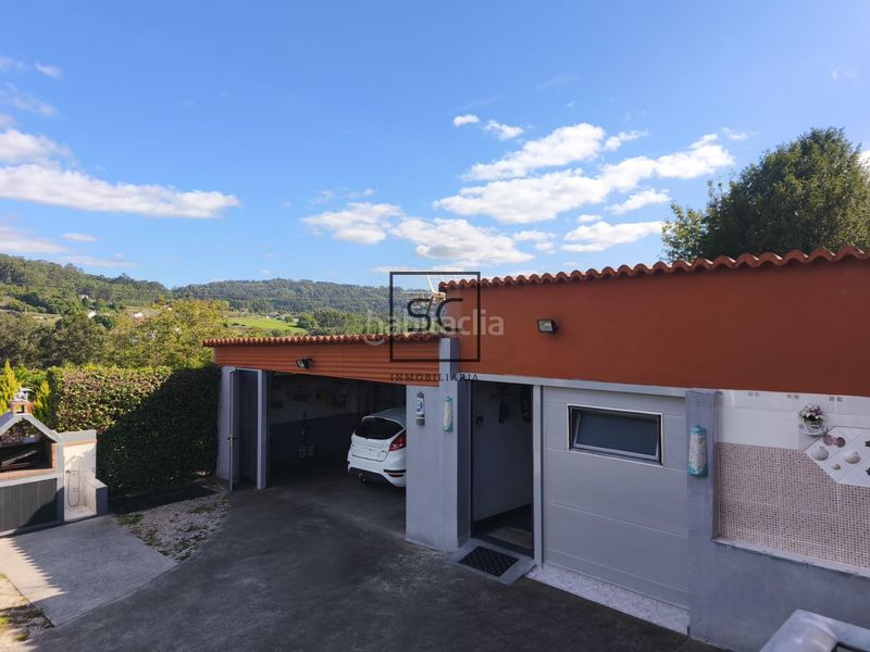 Foto d1770dbd-bd87-4616-bc22-39f8060e5e85. Casa adossada amb calefacció aparcament a Miño