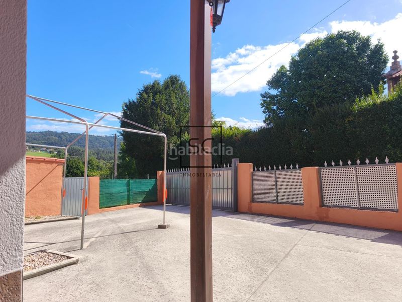 Foto fcfa8ffe-c7e4-4cb3-af34-5a32b8cf3309. Casa adossada amb calefacció aparcament a Miño