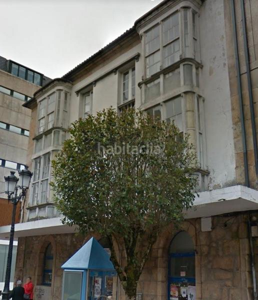Foto f4cd82a5-c57f-4870-87eb-2356f3ce0639. Edifici a Lalín