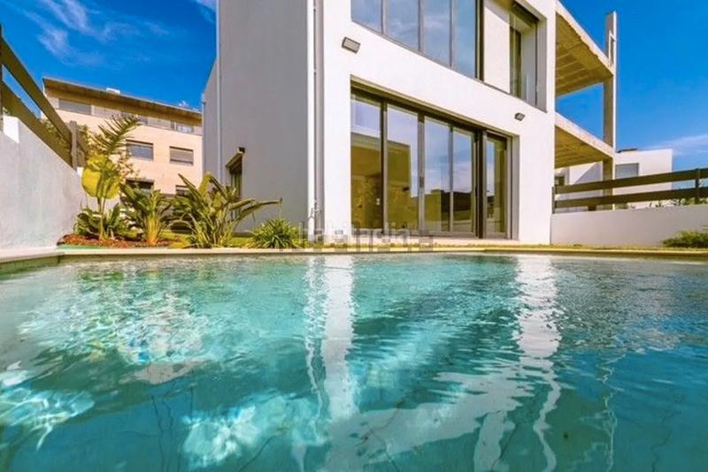 Foto 222b89eb-f55d-42fb-97d7-d564994b42d2. Casa bifamiliare con riscaldamento parcheggio piscina in Vigo