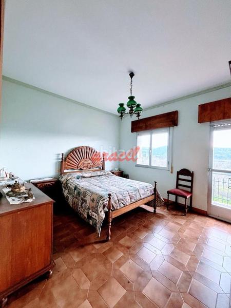 Foto 1635a9fa-d3f4-49b2-9ffc-f6f63c5357f1. Maison avec chauffage parking dans San Rosendo Ourense