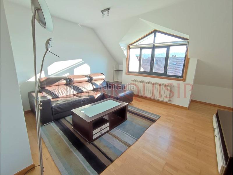 Foto 574fcece-06dc-452d-8b5b-01845d97bf56. Àtic amb calefacció aparcament a O Milladoiro Ames