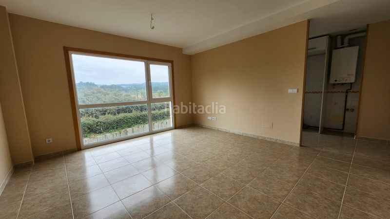 Foto 50240839-942a-4f48-ba2f-0243e92393c1. Apartament amb calefacció aparcament a Miño