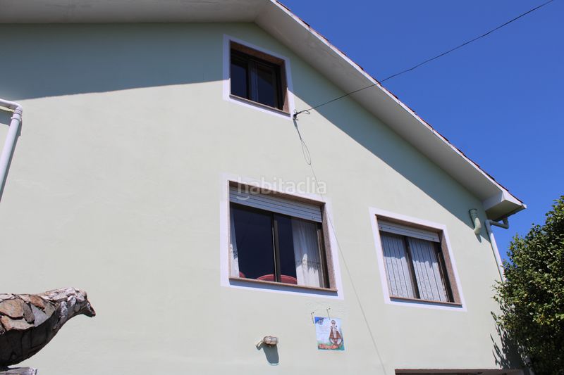 Foto c832f9fa-2817-4d54-9a90-42fa2c755e41. Casa amb aparcament a Miño