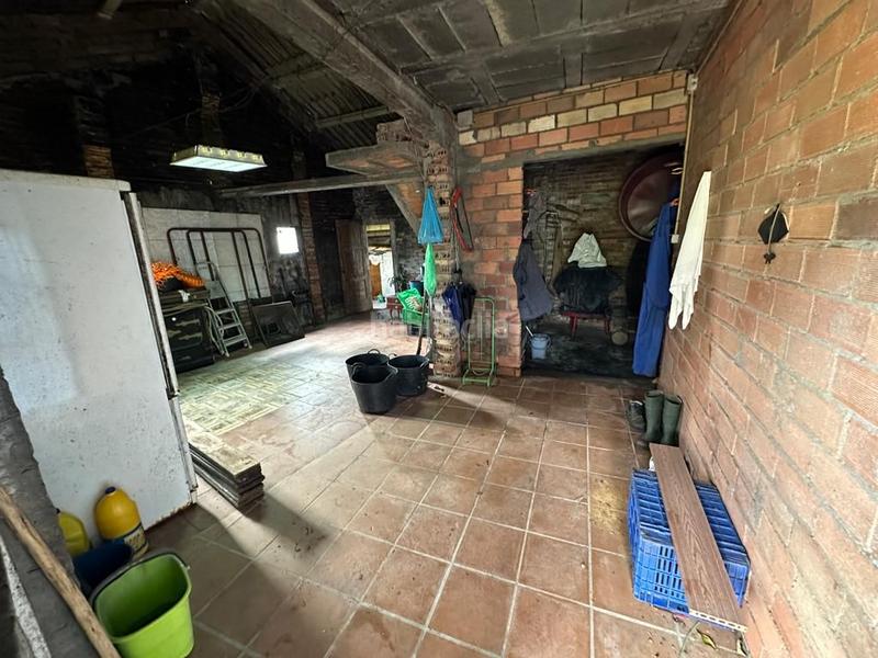 Foto cdd5efb6-d19f-4cb2-ae72-ab527e180e59. Casa  de planta baja con finca en Sobrán Vilagarcía de Arousa