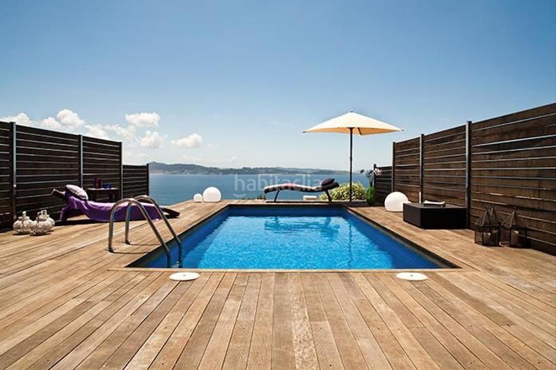 Foto 40137421-6201-4c51-8d93-49b115904716. Casa adossada amb calefacció aparcament piscina a Sanxenxo