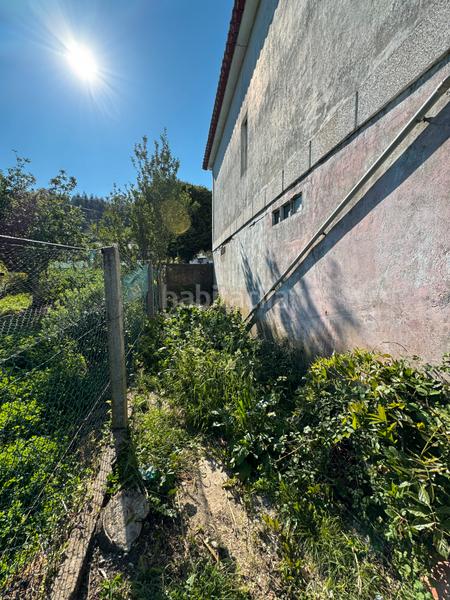 Foto efa84c99-1036-4455-a7f3-c0421c1cfda1. Maison avec parking dans Rubiáns Vilagarcía de Arousa