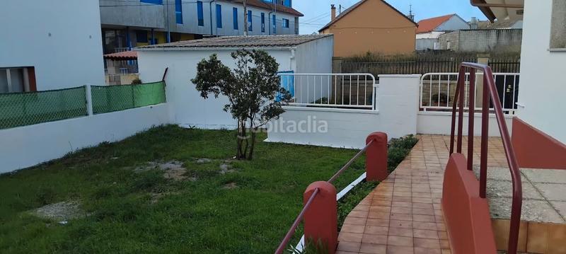 Foto 5cf3b220-b345-41fc-a6ab-57bc593215ee. Casa amb aparcament a Aguiño Ribeira