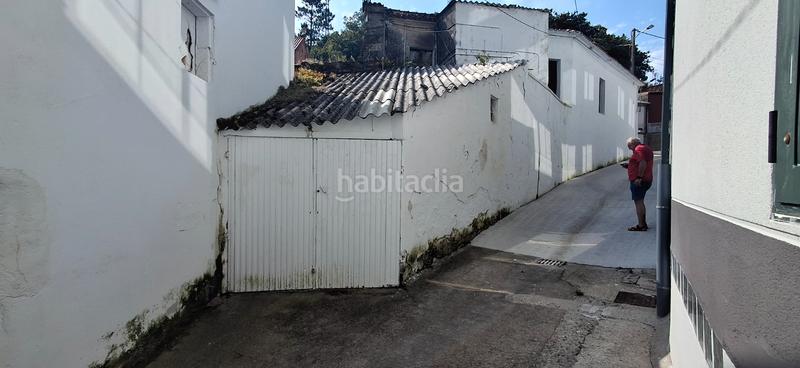 Foto 1d72860b-d841-4a87-8099-d118fb96de8c. Casa en rúa principal 5 asa con garaje para reformar en calle principal en Boiro