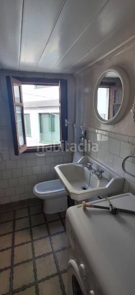 Foto c2c13419-8aee-4d43-84df-18e701f1d6c5. Casa en rúa principal 5 asa con garaje para reformar en calle principal en Boiro