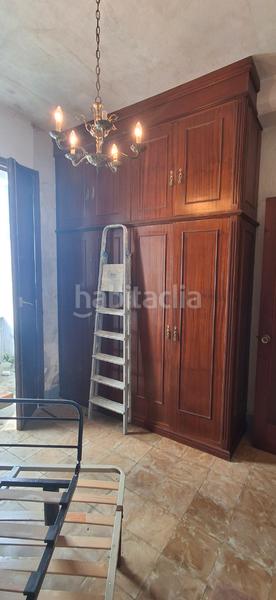 Foto c844c3f8-6263-4359-ae15-7ae889f78bfc. Casa en rúa principal 5 asa con garaje para reformar en calle principal en Boiro