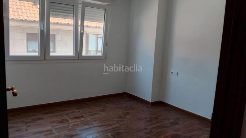 Foto 4dea8456-841b-490c-9388-9da5bf5b6517. Piso amplio piso en el centro en santa uxía de Ribeira Ribeira