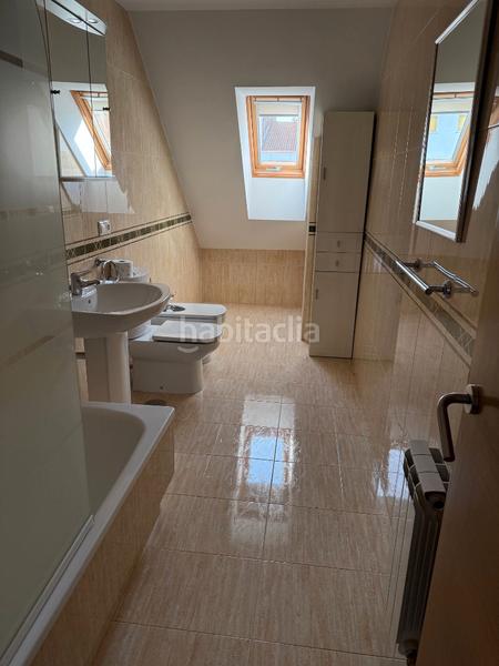 Foto f19ac6dd-4e0f-4257-82ca-ffc9550375ad. Àtic amb calefacció a O Milladoiro Ames