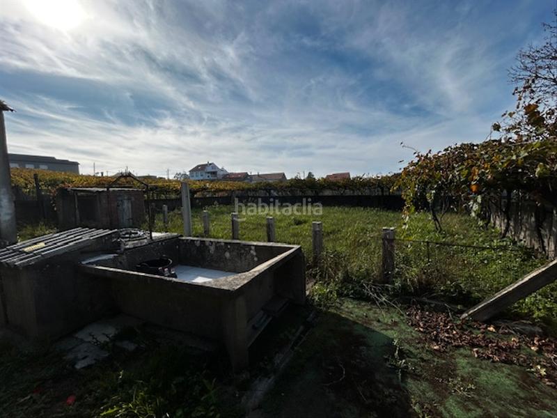 Foto f51c5787-f66b-47e3-ac2c-422c3b768d16. House with parking in Vilanova de Arousa