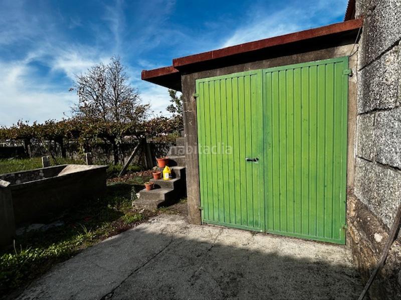 Foto fcd0708d-0957-40bd-909f-f9f7580e3548. House with parking in Vilanova de Arousa