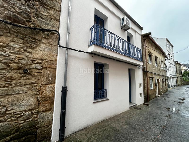 Foto 238e229d-766e-4052-97e9-e615ab2d349e. Casa adossada a rúa esperanza 22 a O Carril Vilagarcía de Arousa