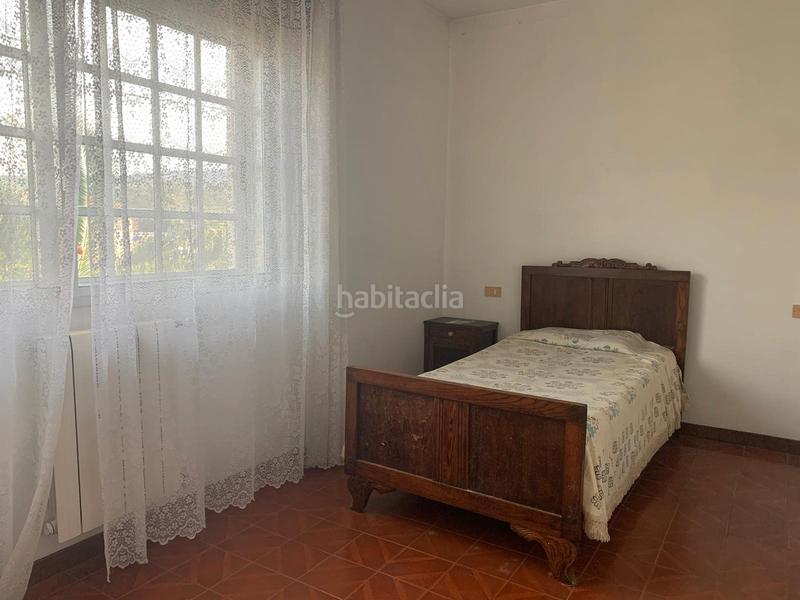 Foto e213fb60-8bb5-4d51-b2db-bce0c29f7655. Casa con camino riscaldamento parcheggio in Meaño