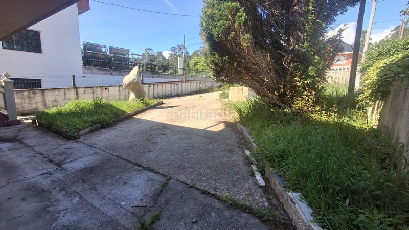 Foto 176c6988-da67-47a4-ab84-31c12841d23c. Xalet amb xemeneia aparcament a Oleiros Ribeira